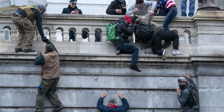Texas militia member sentenced to nearly 5 years in prison for attacking police during Capitol riot
