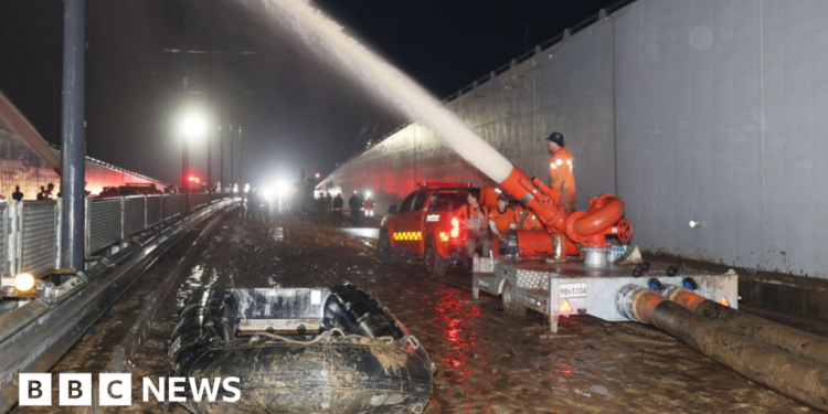 South Korea flood: 13 bodies recovered from flooded tunnel
