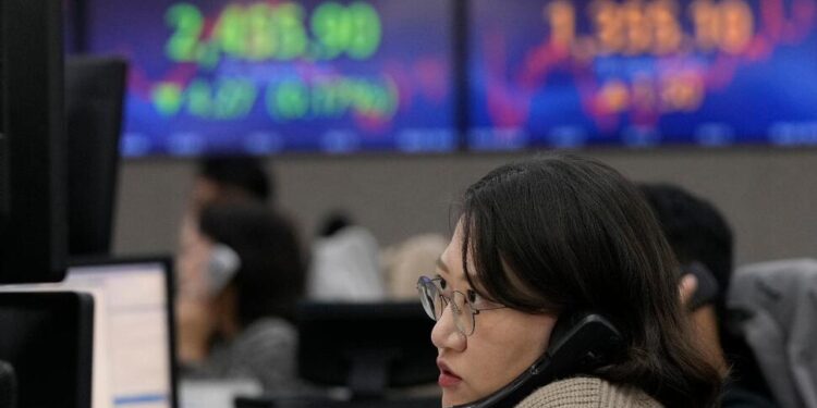 World Markets Edge Lower as China Reports Slower Growth in the Last Quarter