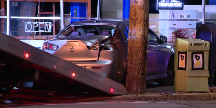 One person hurt when vehicle crashes into business in Homestead