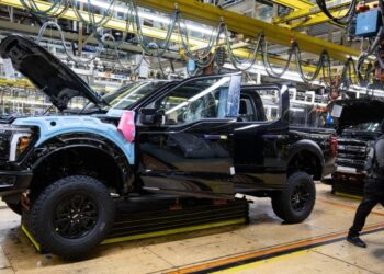 Donald Trump softens car tariffs as he visits industrial heartland in Michigan