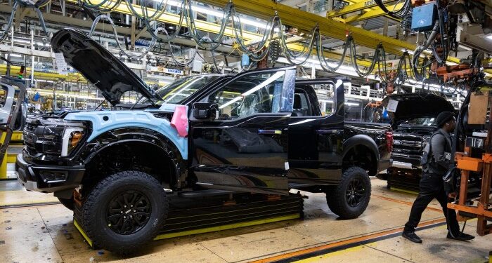 Donald Trump softens car tariffs as he visits industrial heartland in Michigan