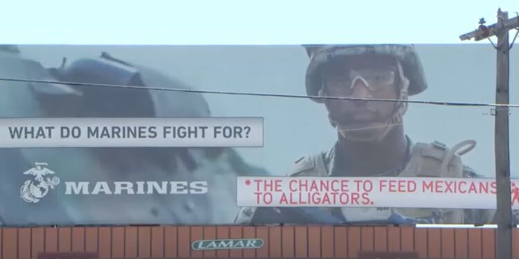 Marine Corps Billboard Defaced By Pro-Illegal Group